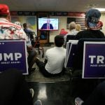 Phoenix residents watch presidential candidate Donald Trump speak at the Republican National Convention on July 18, 2024.