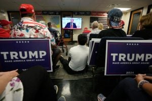 Phoenix residents watch presidential candidate Donald Trump speak at the Republican National Convention on July 18, 2024.