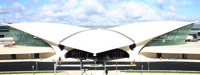 In July 1979 I landed at JFK Airport aboard TWA Flight 709. Above, the Trans World Flight Center architect by Eero Saarinen designed in 1959, and that was converted into a hotel in 2017. (Wikimedia Commons)