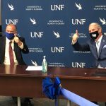 DSC President Tom LoBasso, left, and UNF President David Szymanski an official Memorandum of Understanding between the two institutions at the Oct. 6 press conference. The schools hope their collaboration that will further elevate healthcare education and support the specific needs of the region. (© FlaglerLive)