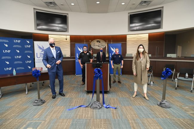 An image released by UNF, with, from left, UNF President David Szymanski, Senator Travis Hutson, Daytona State College President Tom LoBasso, State Representative Paul Renner, City of Palm Coast Mayor Milissa Holland. 