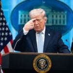 President Donald Trump mimics an Iranian protester being shot while holding a news conference in the White House on April 6, 2026. Tom