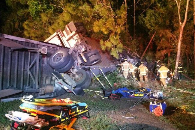 The UPS truck rolled over off I-95. (Flagler County)