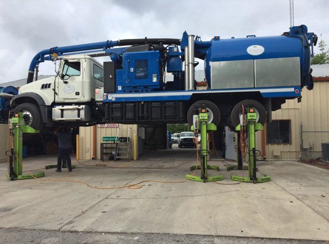 One of Palm Coast's so-called 'Vac-Con' trucks gets a little preventive maintenance at the city's Public Works grounds last week. Vac-Con trucks (the word is actually a registered trademark) are industrial vacuum sewer cleaners. (Palm Coast)