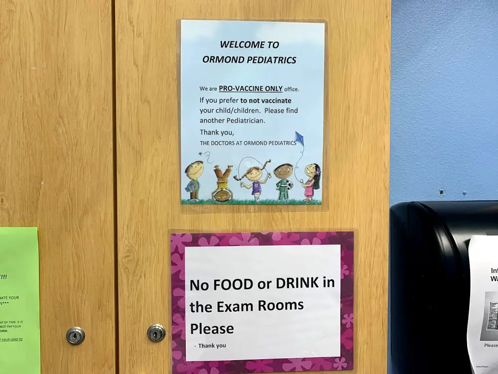 Signs in exam rooms at a local doctor's office. (© FlaglerLive)