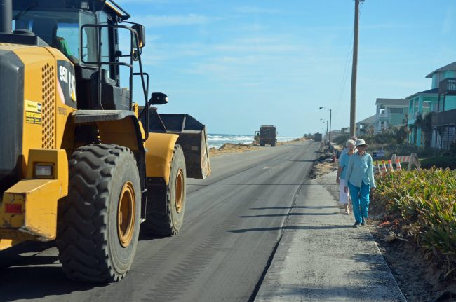 Valerie Reither took a walk with friends along the newly paved, emergency section of A1A in Flagler Beach, set to re-open next week. The road leaves no room between pavement and sidewalk. Click on the image for larger view. (© FlaglerLive)