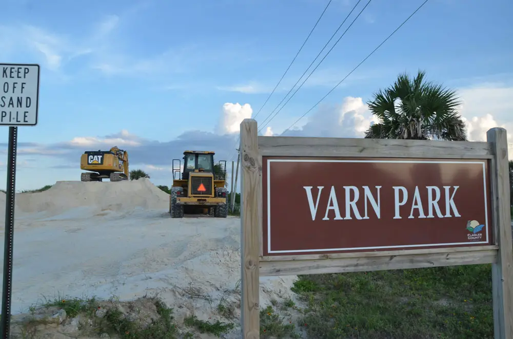 The Varn Park parking lot in August 2018, the last time it was the staging area for a dune rebuilding  project. Those dunes have washed away. (© FlaglerLive)