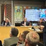 Veranda Bay/Summertown attorney Michael Chiumento, right, addressing members of the Flagler Beach City Commission Thursday evening. Commissioner Rick Belhumeur, left, motioned for approval of annexation of the Summertown segment. The vote carried, 4-1. (© Ben Belhumeur for FlaglerLive)