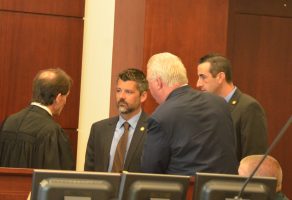 Sidebar: from left, Judge Dennis Craig, Assistant State Attorney Joe LeDonne, defense attorney Garry Wood, and Assistant State Attorney Jason Lewis. (© FlaglerLive)