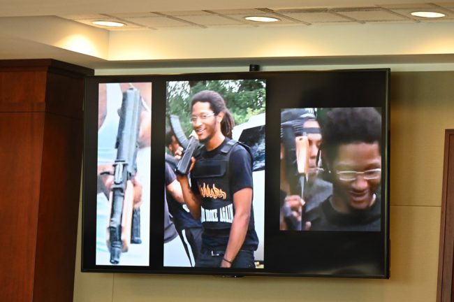 Stills from a rap video showing Marcus Chamblin and the alleged murder weapon. (© FlaglerLive)