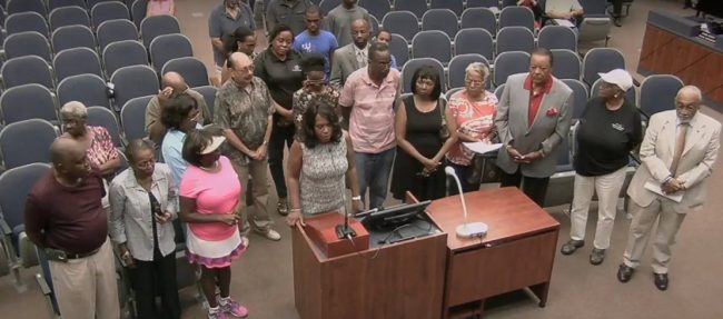 The voices unheard: the NAACP's Linda Sharpe-Matthews acknowledges today's proclamation, which sought to recognize the county's injustice toward minorities over the years. Click on the image for larger view. (© FlaglerLive/Flagler County TV)