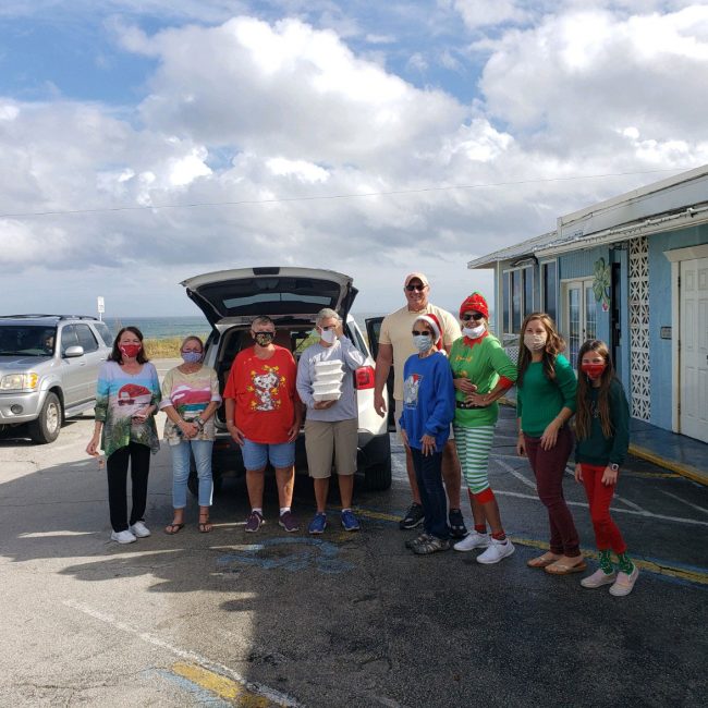 The team of volunteers today who delivered some 150 Christmas meals in Flagler Beach, compliments of Beachfront Grille. The distribution was organized by Flagler Beach Mayor Linda Provencher and Suzie Johnston. (Linda Provencher)