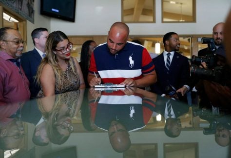 Javon Jackson, center, was able to register to vote following passage of a 2019 Nevada law that restored voting rights to formerly incarcerated individuals.