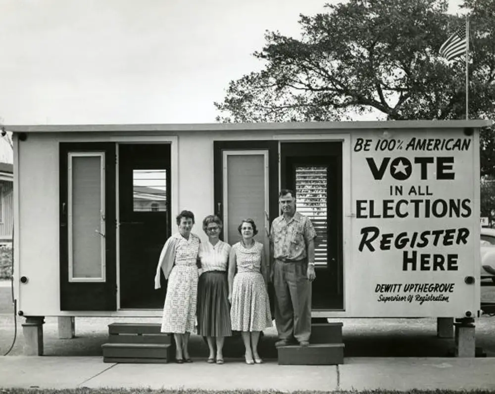 Florida law makes certain Americans less than 100 percent so. Above, officials from the Palm Beach Supervisor of Elections Office in an undated Florida Memory photo believed to be from the 1950s. 