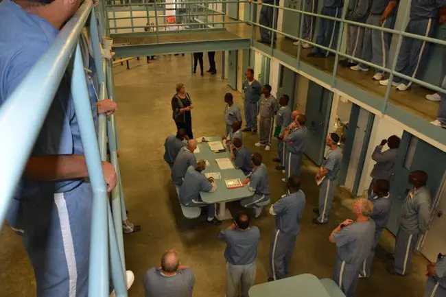 Expect fewer visiting hours. Florida prisons director Julie Jones, seen here speaking with inmates at Wakula prison, is proposing fewer visitation hours as a cost-cutting measure.