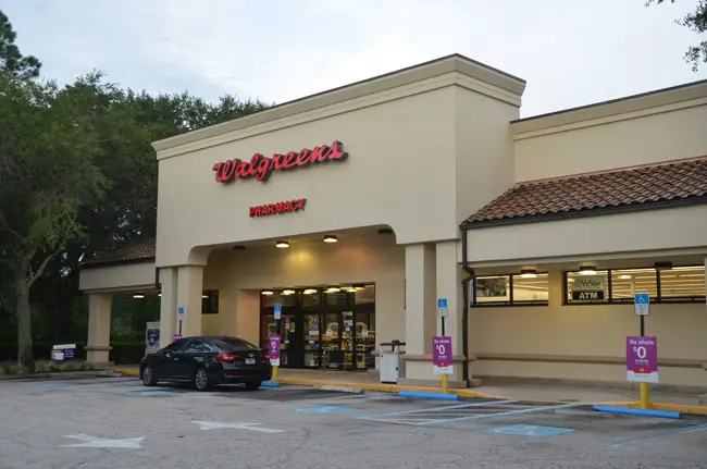 The Walgreens at 1109 Palm Coast Parkway at dawn this morning, a few hours after the robbery. (© FlaglerLive)