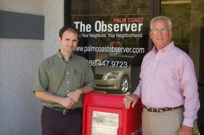 Brian McMillan and John Walsh in 2010 outside the  original Observer offices, which will be moving to Leanni Way. (© FlaglerLive)