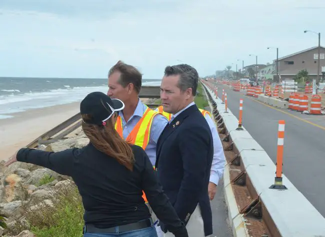 U.S. Rep. Mike Waltz, whose district includes all of Flagler, getting a primer from County Engineer Faith al-Khatib today on the county's reconstruction efforts along the coast, with the state transportation department, following the 2016 and 2017 hurricanes. (© FlaglerLive)