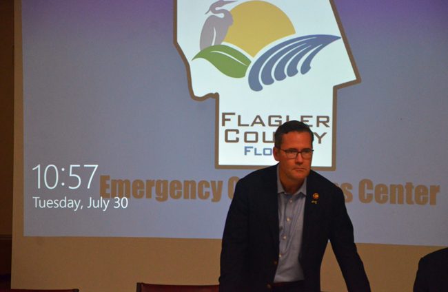 First-year Congressman John Waltz, whose district includes all of Flagler, getting set for his discussion with county directors this morning at the county's Emergency Operations Center. (c FlaglerLive)