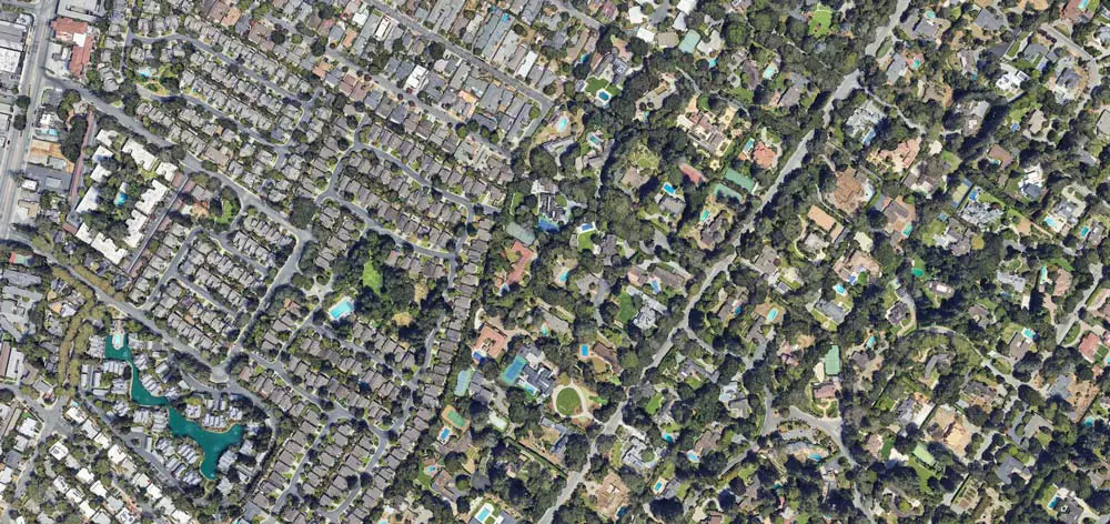The line between Atherton, Calif., (right) and its neighbor is obvious in property sizes. (Google Earth)