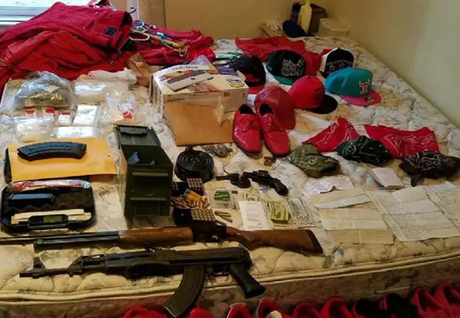 Weaponry, ammunition, and other items seized in the search. (FCSO)
