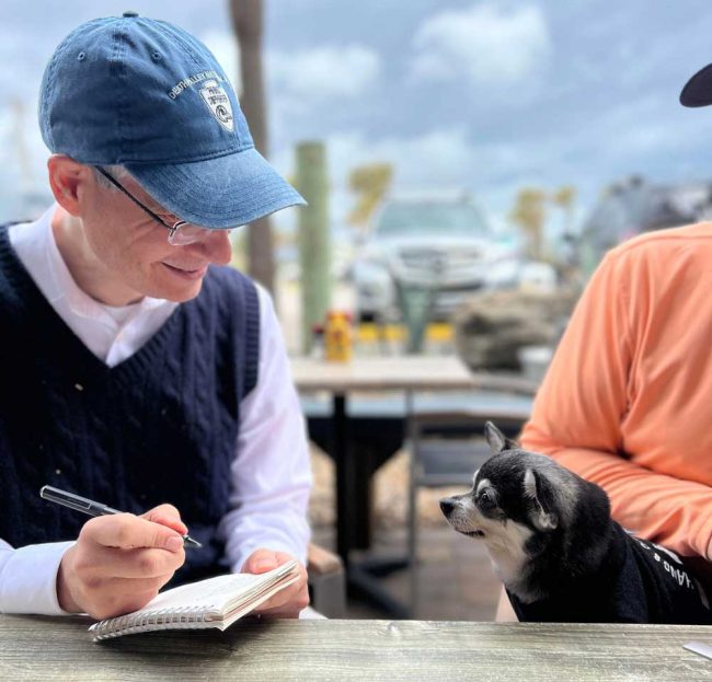 Wednesday getting interviewed about the Hang 8 surfing contest. She insisted, through her lawyres, on a non-disclosure agreement until after the competition. Something about not jinxing her performance. (© Suzie Johnston for FlaglerLive)