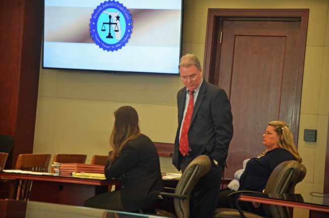 Kimberle Weeks, right, with her attorneys Kevin Kulik and Ashley Kay at trial in April 2018. (© FlaglerLive)