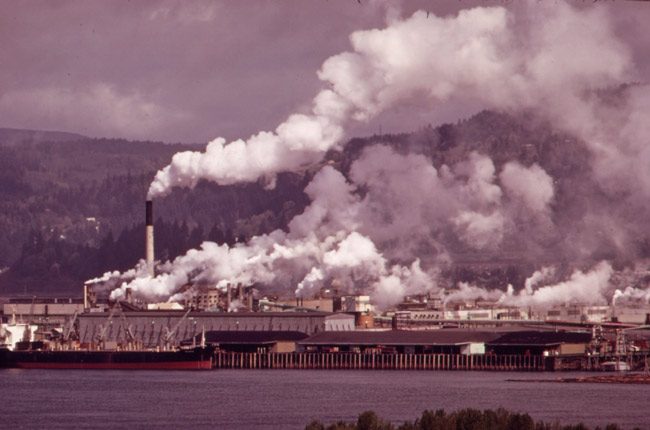A Weyerhauser paper mill on the Columbia River. Temperatures have increased much faster in the western part of the United States than in the South. (National Archives)