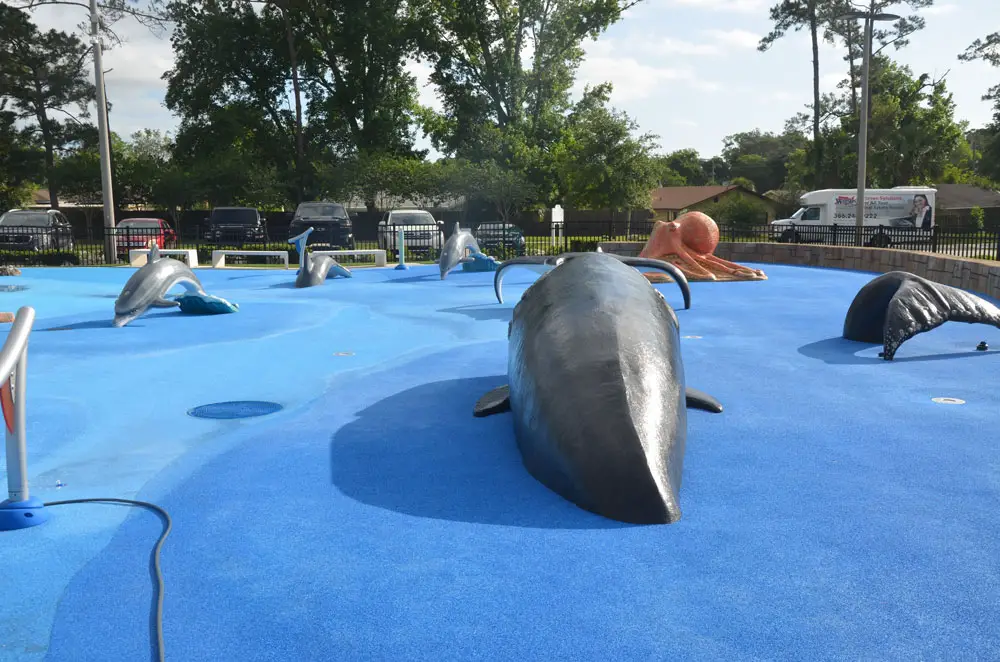 The whale and whale tail, the mantra ray, the rings, and the two turtles in the toddler area will be closed to the public as repairs to the splash pad at Holland Park proceed. (© FlaglerLive)