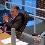 Flagler Beach City Manager William Whitson, left, and City Attorney Drew Smith at tonight's Flagler Beach City Commission meeting. (Flagler Beach video)