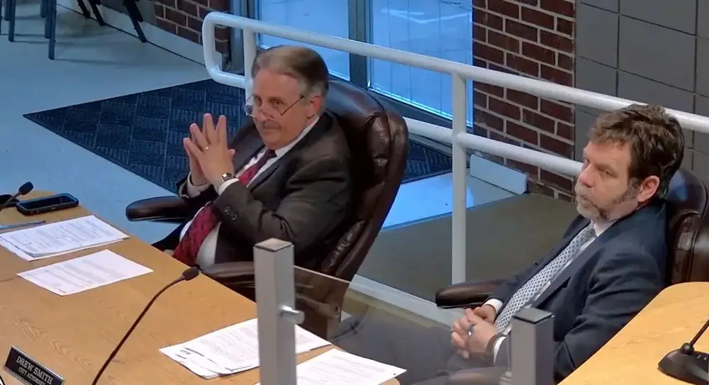 Flagler Beach City Manager William Whitson, left, and City Attorney Drew Smith at tonight's Flagler Beach City Commission meeting. (Flagler Beach video)
