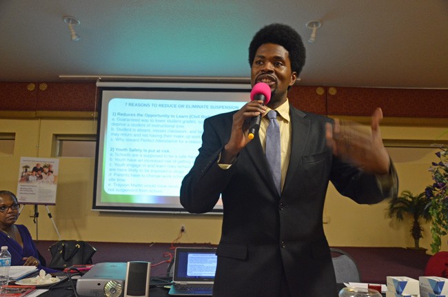 The Souther Poverty Law Center's Amir Whitaker, speaking candidly to the Flagler NAACP Tuesday evening about lingering bias and racism in Flagler schools. (c FlaglerLive) 