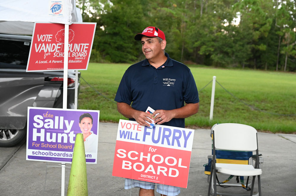 Will Furry campaigning for the school board seat in August 2022. (© FlaglerLive)