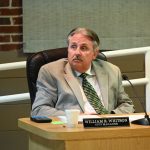 Flagler Beach City Manager William Whitson had to answer uncomfortable questions about July 4 plans at Thursday's Flagler Beach City Commission meeting. (© FlaglerLive)