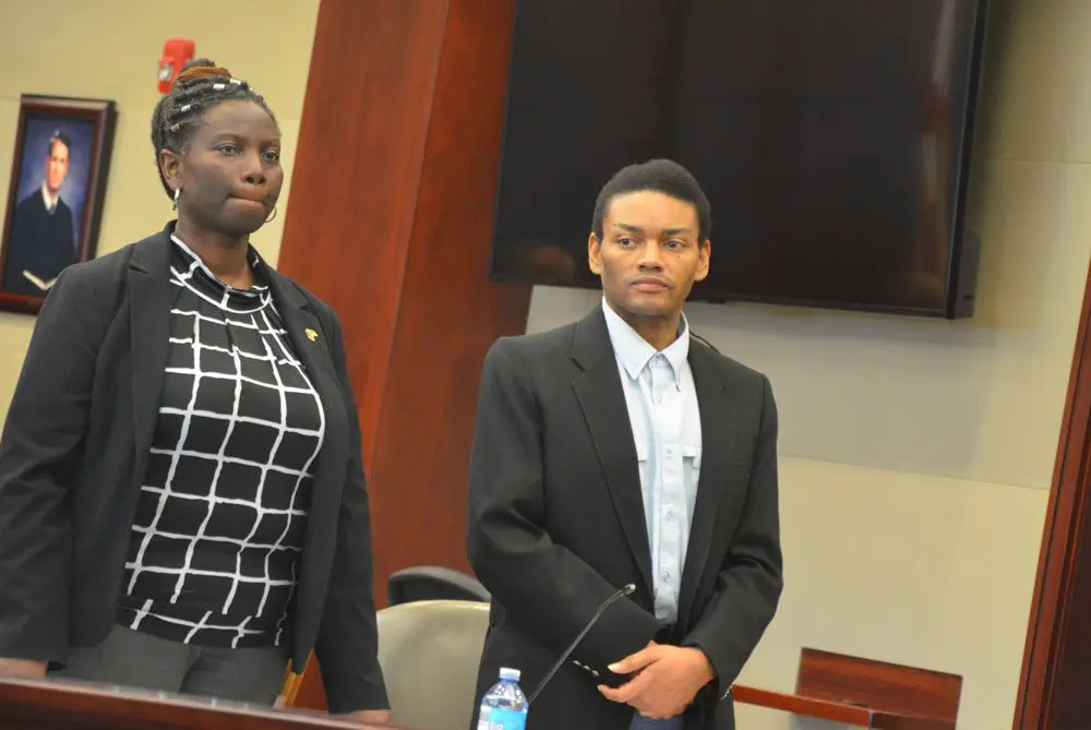 Victor Williams with his attorney, Assistant Public Defender Regina Nunnally. (© FlaglerLive)A