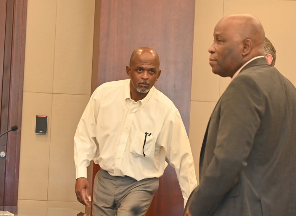 Jermaine Williams Sr., left, who faces the death penalty, with one of his attorneys today, Junior Barrett during jury selection. (© FlaglerLive)