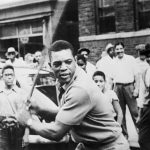 Willie Mays playing stickball in Harlem in 1954.