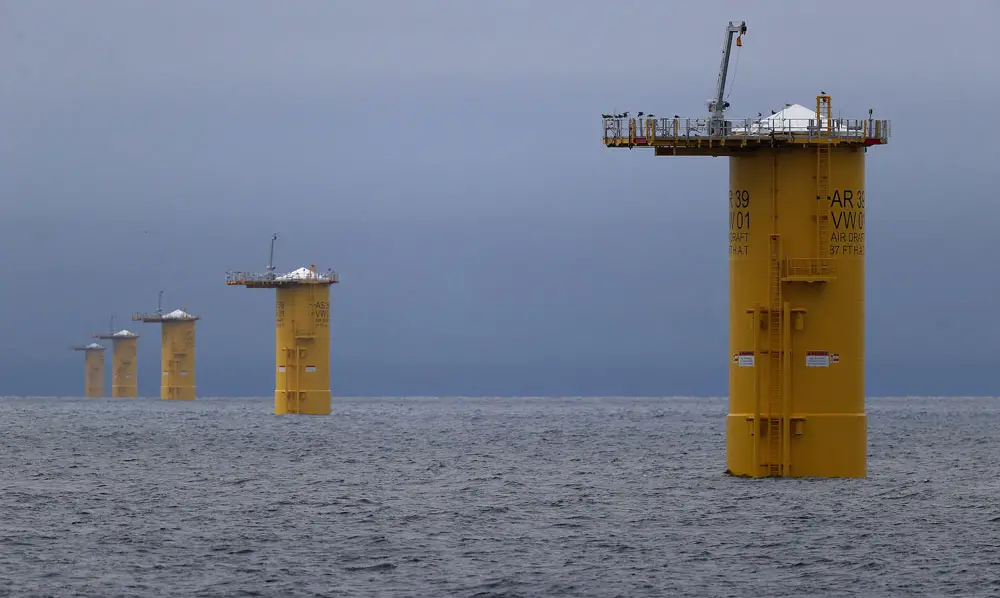 A row of monopiles that will be the base for offshore wind turbines, in the Atlantic Ocean off the coast of Martha’s Vineyard, Mass. 