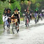 Some 30 witrches took part in the first annual the first Witches of Flagler Beach Bike Ride Saturday morning through a 2.5-mile circuit in the city. The event was organized by Flagler Beach Creates, an organization focused on public art and culture in the city. (© FlaglerLive)