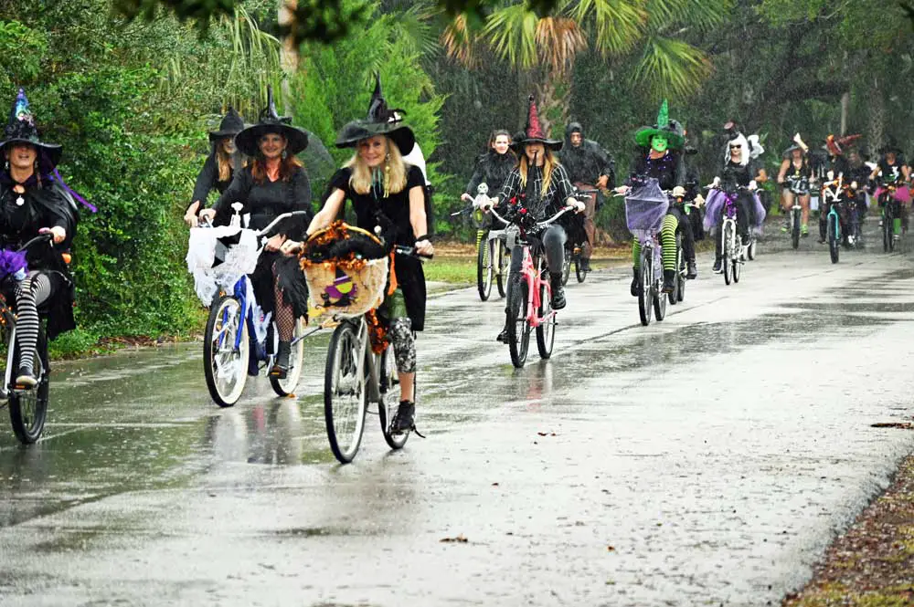 Some 30 witches took part in the first annual the first Witches of Flagler Beach Bike Ride Saturday morning through a 2.5-mile circuit in the city. The event was organized by Flagler Beach Creates, an organization focused on public art and culture in the city. (© FlaglerLive)