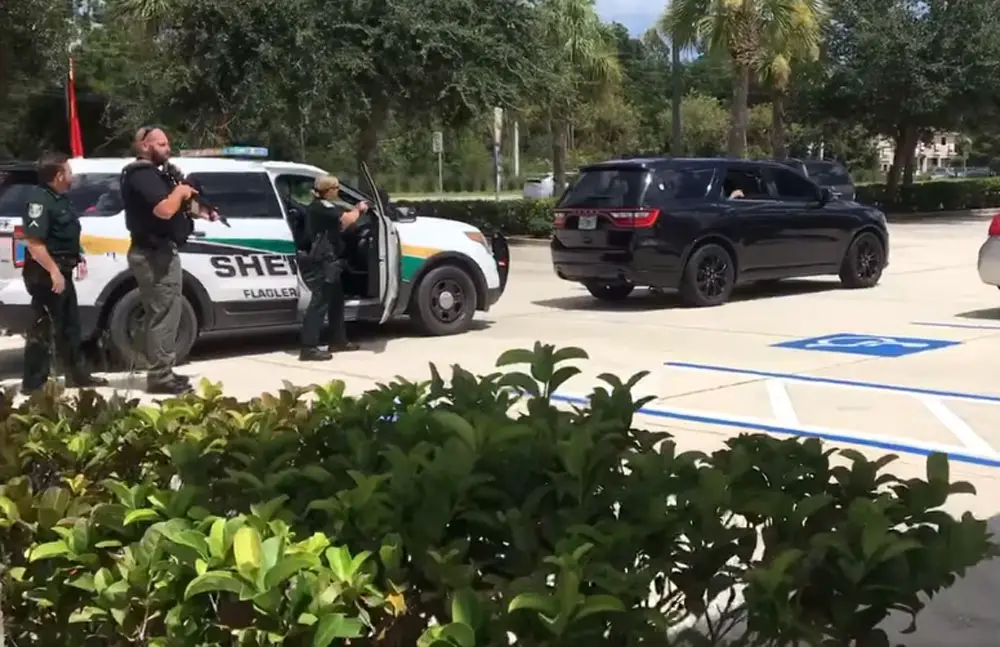 A video screen capture of the felony stop a little after 1 p.m. in the parking lot of Flagler Broadcasting's WNZF radio station. (WNZF video)