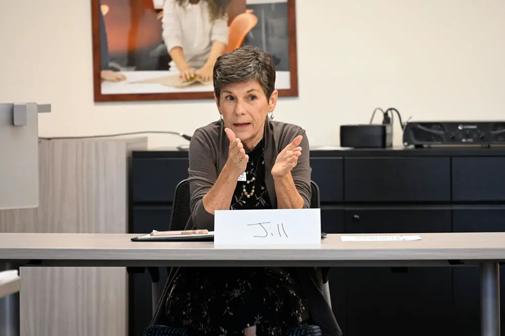 Flagler County School Board member Jill Woolbright, seen here at a workshop last week, complained Tuesday evening during a board meeting that asymptomatic children deemed close contacts to known infections were having to quarantine. (© FlaglerLive)