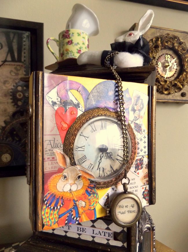 'Don’t Be Late,' Judi Wormeck’s Alice-in-Wonderland-themed, mixed-media clock-artwork, won Best of Show at 'It’s About Time,' a recent multi-artist, themed exhibition at the Flagler County Art League. Click on the image for larger view. (© FlaglerLive)