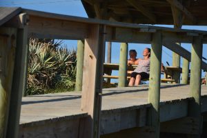 Richie and Antoinette Allen of Palm Coast this morning by the beach. (© FlaglerLive)