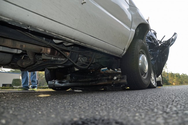 The Toyota's chassis went past the Ford van's front wheels' axle. Click on the image for larger view. (© FlaglerLive)