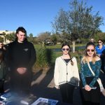 Their first novels already published, they're working on their second. From left, Caleb Hathaway and MacKenzie Wheat of Flagler Palm Coast High School, and Abbigail of Matanzas High School. They were featured authors at last Thursday's Read Across Flagler event at Palm Coast's Central Park. (© FlaglerLive)