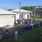 The ribbon-cutting at Palm Coast's Waste Water Treatment Plant 2 this morning included, unusually, the mayor, and less unusually, City Council members Dave Sullican and Charles Gambaro, among others. (© FlaglerLive)