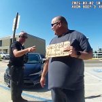 Flagler Beach Police Sgt. Steve Yelvington, left, at the beginning of his interaction with Jeff Gray, before arresting him. (© FlaglerLive via bodycam)