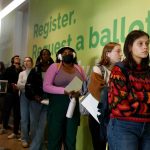 People line up to cast early ballots during the 2022 election at the University of Michigan. (Jeff Kowalsky/AFP via Getty Images)