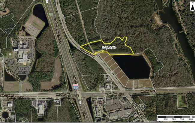 The 12 acres that would be rezoned for apartments, outlined in yellow. Click on the image for larger view.